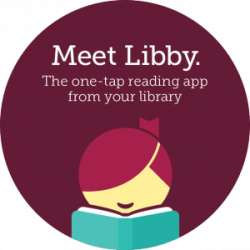 Smiling girl reading a book. Meet Libby. The one-tap reading app from your library