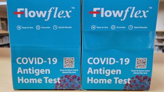 Two boxes of Flowflex COVID-19 tests