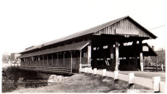 Old photo of the Newton Falls double covered bridge.