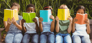Five children reading side by side.